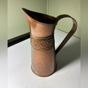 Copper look watering can. 9 1/2”